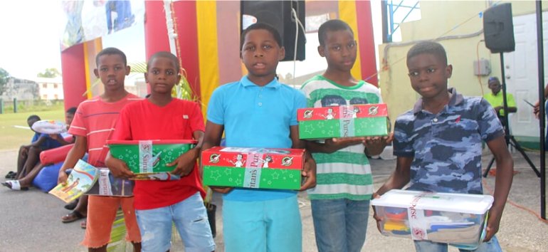 Samaritans Purse Operation Christmas Child shoebox gift distribution at the Mount Zion's Missions Inc Barbados Foursquare Church Impact Community Outreach Children's fun Outreach in Barbados